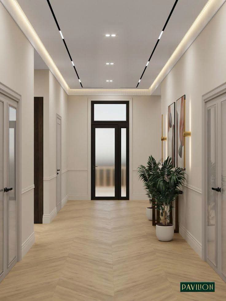 تصميم مدخل وممر بإضاءة سقف مخفية